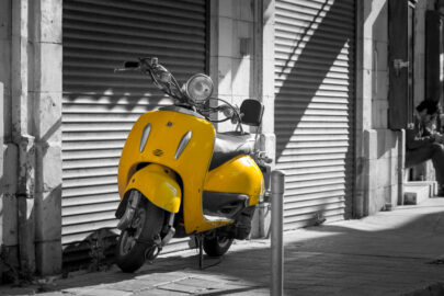 Vintage yellow scooter in the old street - slon.pics - free stock photos and illustrations