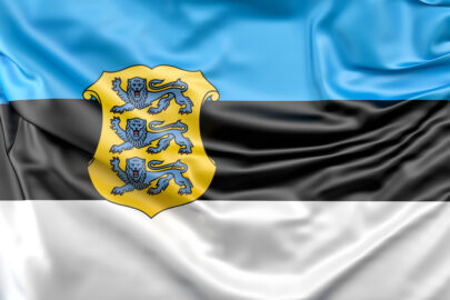 Flag of Estonia with coat of arms - slon.pics - free stock photos and illustrations