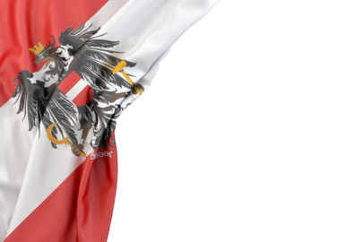Flag of Austria with coat of arms in the corner on white background. Isolated, contains clipping path - slon.pics - free stock photos and illustrations