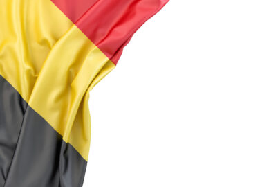 Flag of Belgium in the corner on white background. Isolated, contains clipping path - slon.pics - free stock photos and illustrations