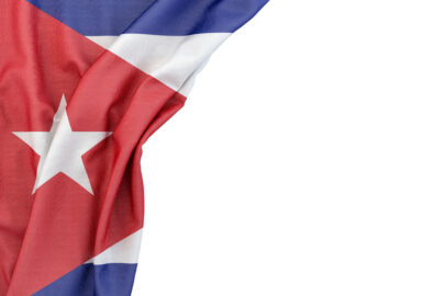 Flag of Cuba in the corner on white background. Isolated, contains clipping path - slon.pics - free stock photos and illustrations