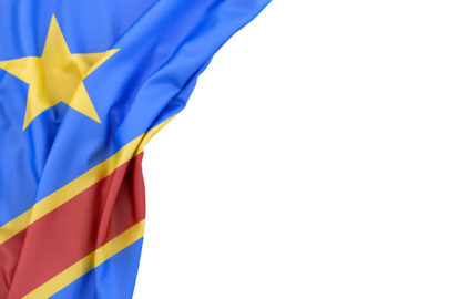 Flag of Democratic Republic of the Congo in the corner on white background. Isolated, contains clipping path - slon.pics - free stock photos and illustrations