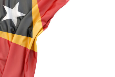 Flag of East Timor in the corner on white background. Isolated, contains clipping path - slon.pics - free stock photos and illustrations