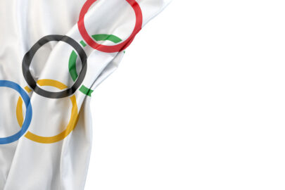 Olympics flag in the corner on white background. Isolated, contains clipping path - slon.pics - free stock photos and illustrations