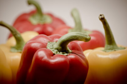 Close up of mixed yellow and red fresh bell peppers - slon.pics - free stock photos and illustrations