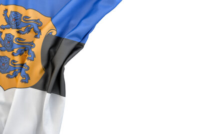 Flag of Estonia with coat of arms in the corner on white background. Isolated, contains clipping path - slon.pics - free stock photos and illustrations