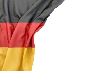 Flag of Germany in the corner on white background. Isolated, contains clipping path - slon.pics - free stock photos and illustrations
