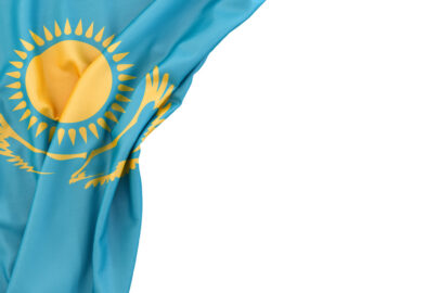 Flag of Kazakhstan in the corner on white background. Isolated, contains clipping path - slon.pics - free stock photos and illustrations