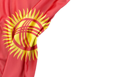 Flag of Kyrgyzstan in the corner on white background. Isolated, contains clipping path - slon.pics - free stock photos and illustrations
