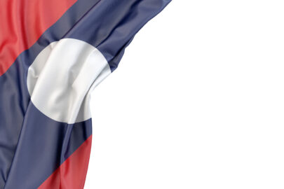 Flag of Laos in the corner on white background. Isolated, contains clipping path - slon.pics - free stock photos and illustrations