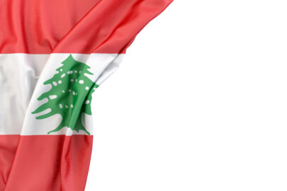 Flag of Lebanon in the corner on white background. Isolated, contains clipping path - slon.pics - free stock photos and illustrations