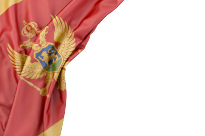 Flag of Montenegro in the corner on white background. Isolated, contains clipping path - slon.pics - free stock photos and illustrations