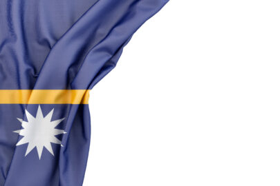 Flag of Nauru in the corner on white background. Isolated, contains clipping path - slon.pics - free stock photos and illustrations