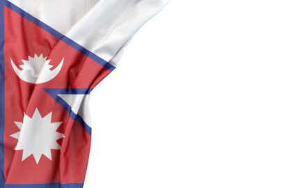 Flag of Nepal in the corner on white background. Isolated, contains clipping path - slon.pics - free stock photos and illustrations