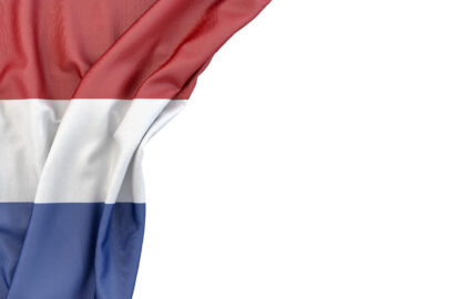 Flag of Netherlands in the corner on white background. Isolated, contains clipping path - slon.pics - free stock photos and illustrations