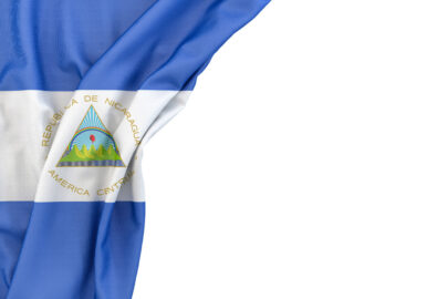 Flag of Nicaragua in the corner on white background. Isolated, contains clipping path - slon.pics - free stock photos and illustrations