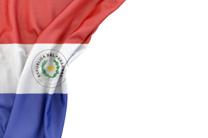 Flag of Paraguay in the corner on white background. Isolated, contains clipping path - slon.pics - free stock photos and illustrations
