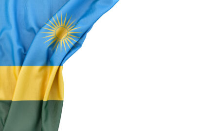 Flag of Rwanda in the corner on white background. Isolated, contains clipping path - slon.pics - free stock photos and illustrations