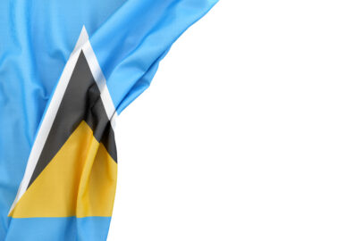 Flag of Saint Lucia and Nevis in the corner on white background. Isolated, contains clipping path - slon.pics - free stock photos and illustrations