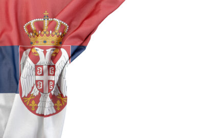 Flag of Serbia in the corner on white background. Isolated, contains clipping path - slon.pics - free stock photos and illustrations