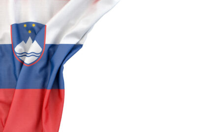 Flag of Slovenia in the corner on white background. Isolated, contains clipping path - slon.pics - free stock photos and illustrations