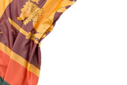 Flag of Sri Lanka in the corner on white background. Isolated, contains clipping path - slon.pics - free stock photos and illustrations