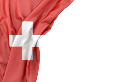 Flag of Switzerland in the corner on white background. Isolated, contains clipping path - slon.pics - free stock photos and illustrations
