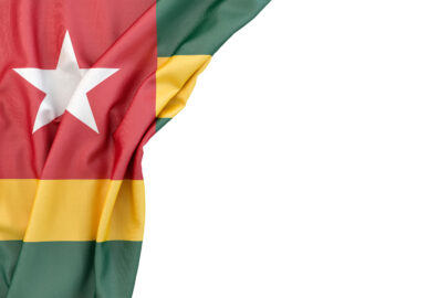 Flag of Togo in the corner on white background. Isolated, contains clipping path - slon.pics - free stock photos and illustrations