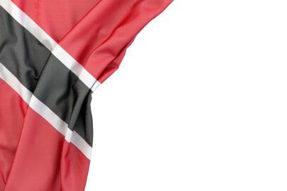 Flag of Trinidad and Tobago in the corner on white background. Isolated, contains clipping path - slon.pics - free stock photos and illustrations