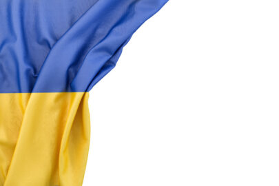 Flag of Ukraine in the corner on white background. Isolated, contains clipping path - slon.pics - free stock photos and illustrations