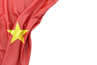 Flag of Vietnam in the corner on white background. Isolated, contains clipping path - slon.pics - free stock photos and illustrations