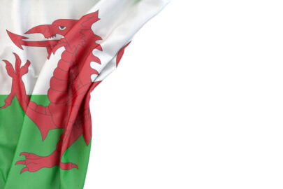 Flag of Wales in the corner on white background. Isolated, contains clipping path - slon.pics - free stock photos and illustrations