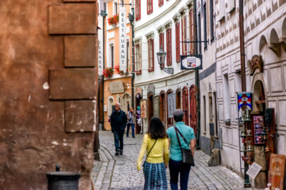 People walking through the historic town of Cesky Krumlov, Czech Republic. September 06, 2016 - slon.pics - free stock photos and illustrations