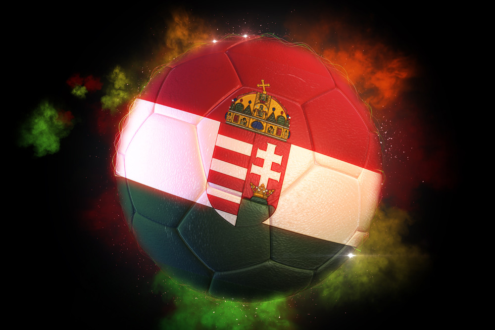Soccer ball textured with flag of Hungary with Coat Of Arms
