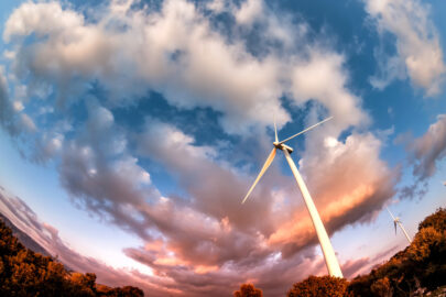 Wind turbine against a dramatic, cloudy, evening sky - slon.pics - free stock photos and illustrations