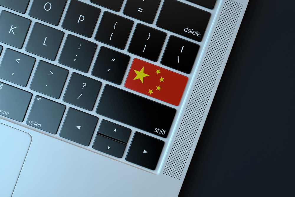 Chinese flag over computer keyboard