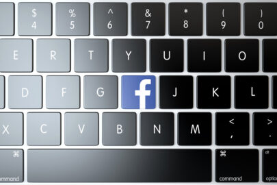 Facebook icon on laptop keyboard. Technology concept - slon.pics - free stock photos and illustrations