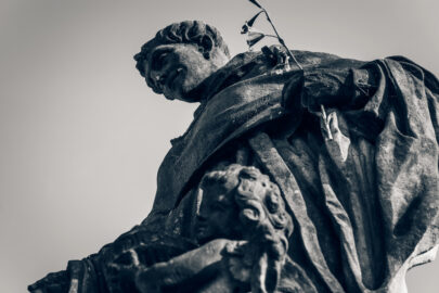 Statue of St. Nicholas of Tolentino on Charles Bridge. Prague, Czech Republic - slon.pics - free stock photos and illustrations