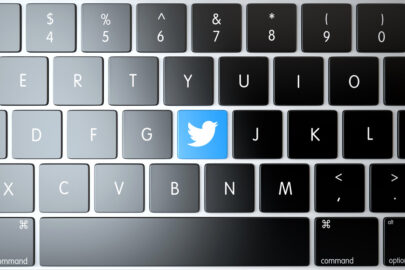 Twitter icon on laptop keyboard. Technology concept - slon.pics - free stock photos and illustrations