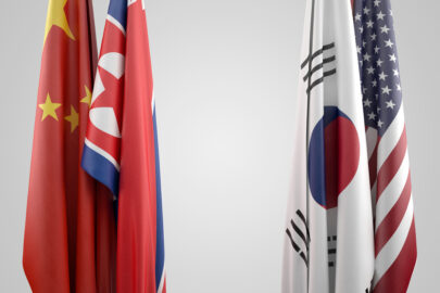 Flags of USA, China, South and North Korea. Political confrontation concept - slon.pics - free stock photos and illustrations