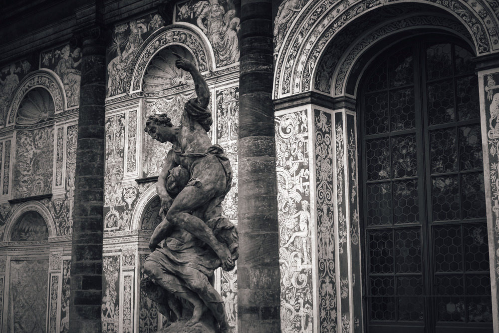 Alegory of night – baroque sculpture at in front of Real tennis room. Royal Garden of Prague Castle, Czech Republic
