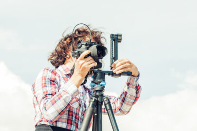 Photographer Setting Up Her Camera - slon.pics - free stock photos and illustrations