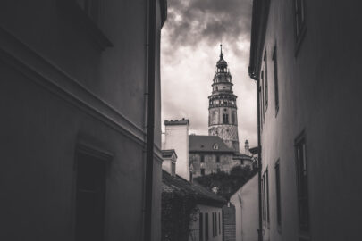 View of a cstle tower through the narrow street of Cesky Krumlov - slon.pics - free stock photos and illustrations