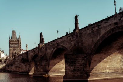 The historic 14th century Charles Bridge in Prague over the river Vlatava - slon.pics - free stock photos and illustrations