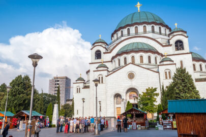 Tourists standing in front of the Saint Sava cathedral in Belgrade. Serbia - slon.pics - free stock photos and illustrations