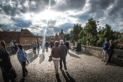 Tourists walking across The Charles Bridge. Prague - slon.pics - free stock photos and illustrations